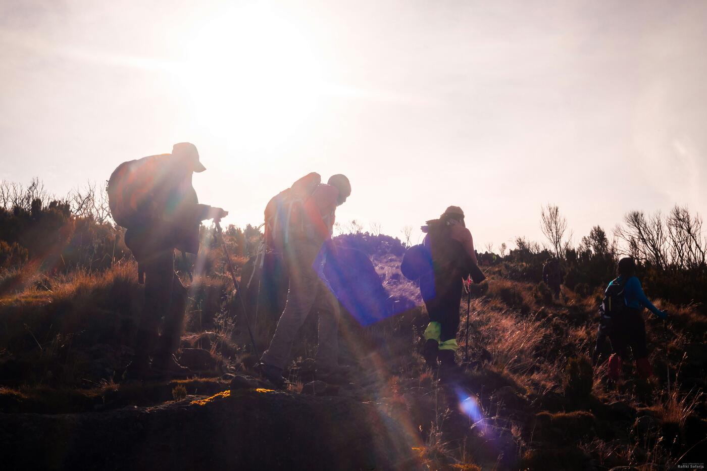 Trekkers on the mountain at sunrise